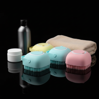 Sylikonowa gąbka z dozownikiem na szampon